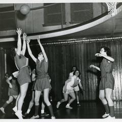 Women's Athletic Association members playing basketball