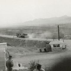 "A convoy going past camp"