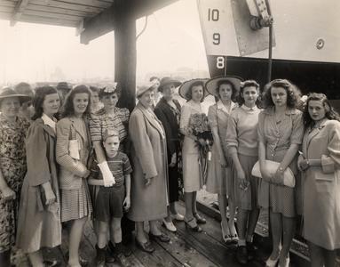 Forties fashions at a minesweeper launching