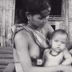Nyaheun mother with baby in the Houei Kong Cluster in Attapu Province