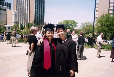Two students after graduation in 2004