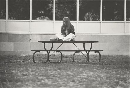 Woman on picnic table