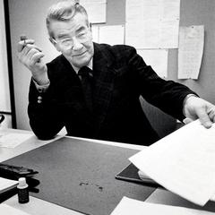 Merrill Jensen at desk