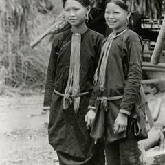 Two Lanten women in traditional dress in Houa Khong Province