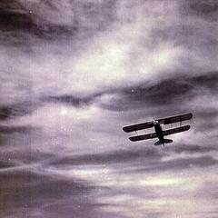 Airplane in flight over Racine Airport