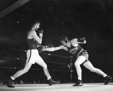 Boxing match action vs. Washington State in Fieldhouse