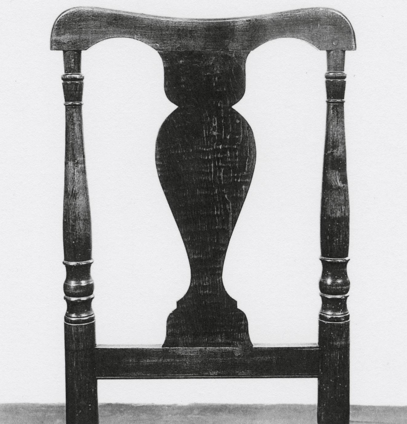 Black and white photograph of a "splat-back" side chair back.