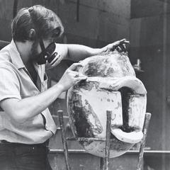 An art student making a sculpture