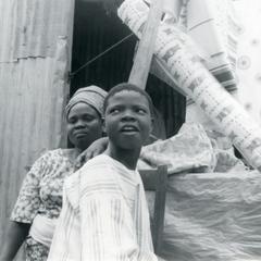 Nike's mother and Funlola with cloth