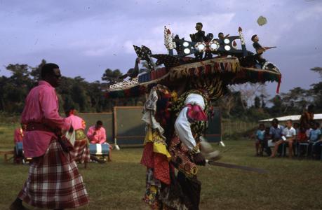 Men perform during the Arugu masquerade.