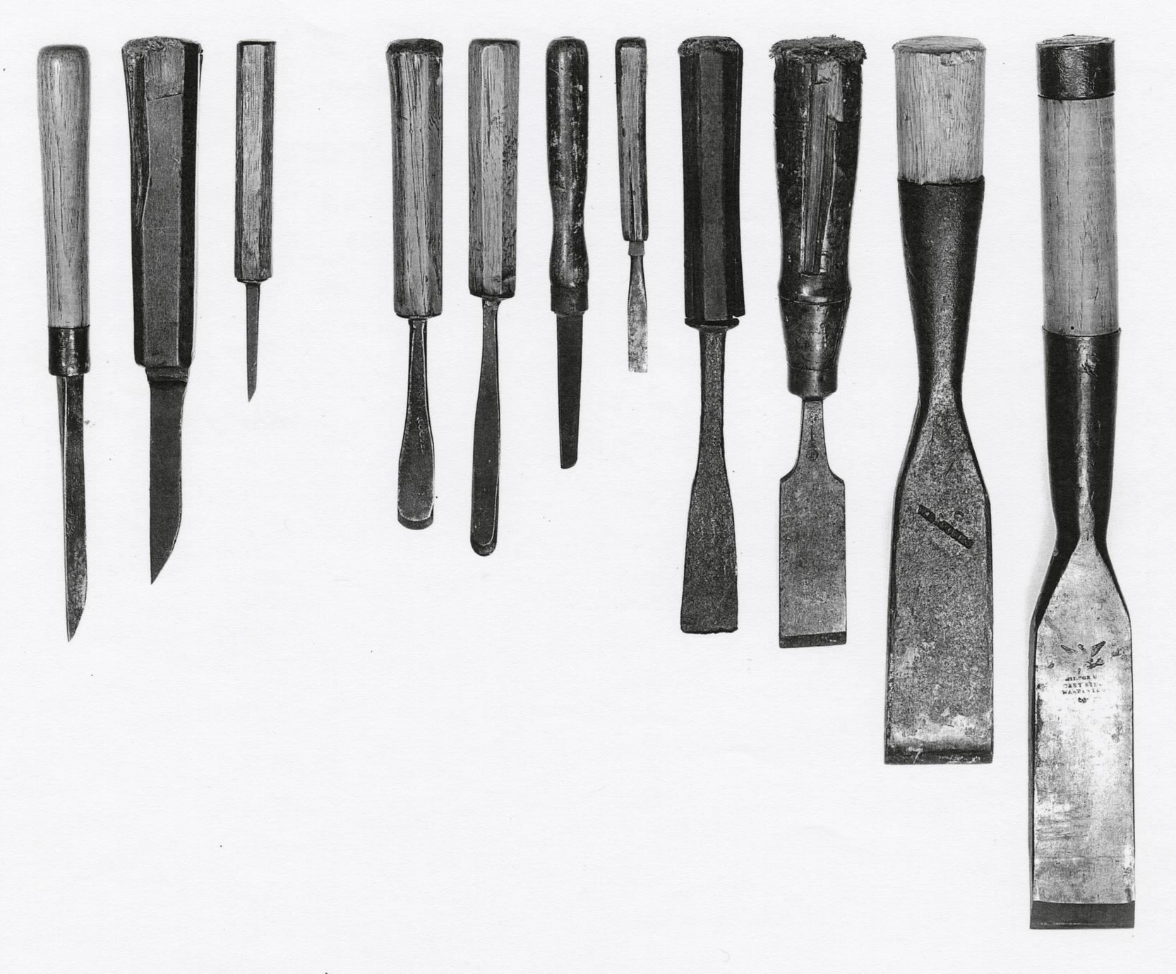 Eleven examples of different sizes and shapes of chisels.