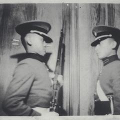 Two cadets, one with rifle