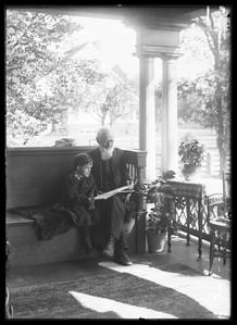 F. W. Lyman and Elizabeth on porch