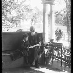 F. W. Lyman and Elizabeth on porch