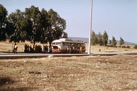 Bus Picking up Passengers in the Countryside