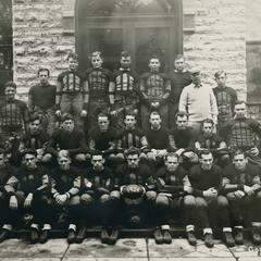 1929 Wisconsin Mining School football team seated on stairs