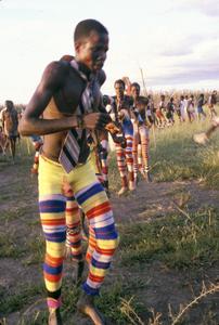Nuer Men Dancing with Colorful Leggings