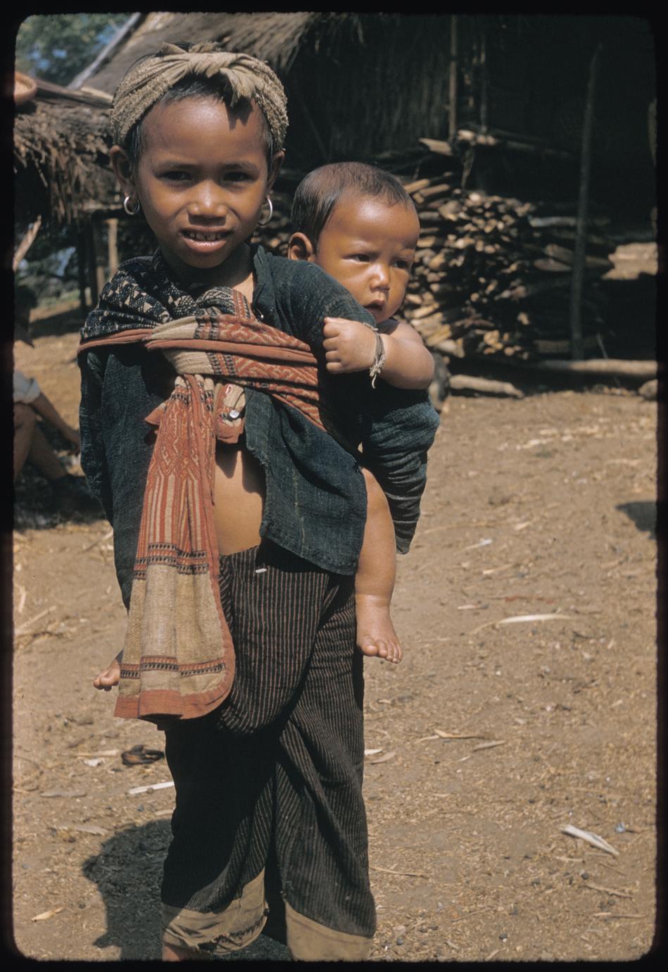 ‎Kammu (Khmu') Girl With Baby - UWDC - UW-Madison Libraries