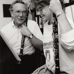 Music professor Albert "Bud" Asch working with a clarinet student