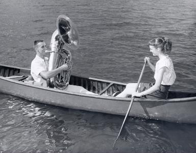 Playing the tuba in a canoe