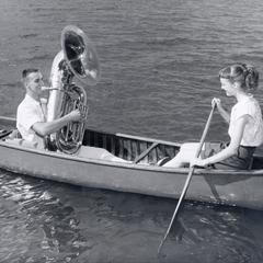 Playing the tuba in a canoe