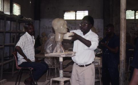 Agbo Folarin with sculpture