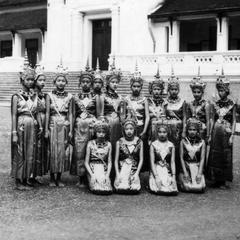 Formal portrait of the royal dancers outside of the Royal Palace