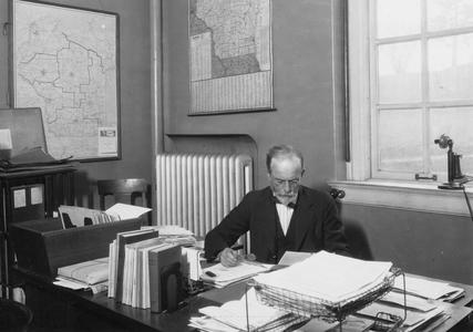 William Lighty at desk