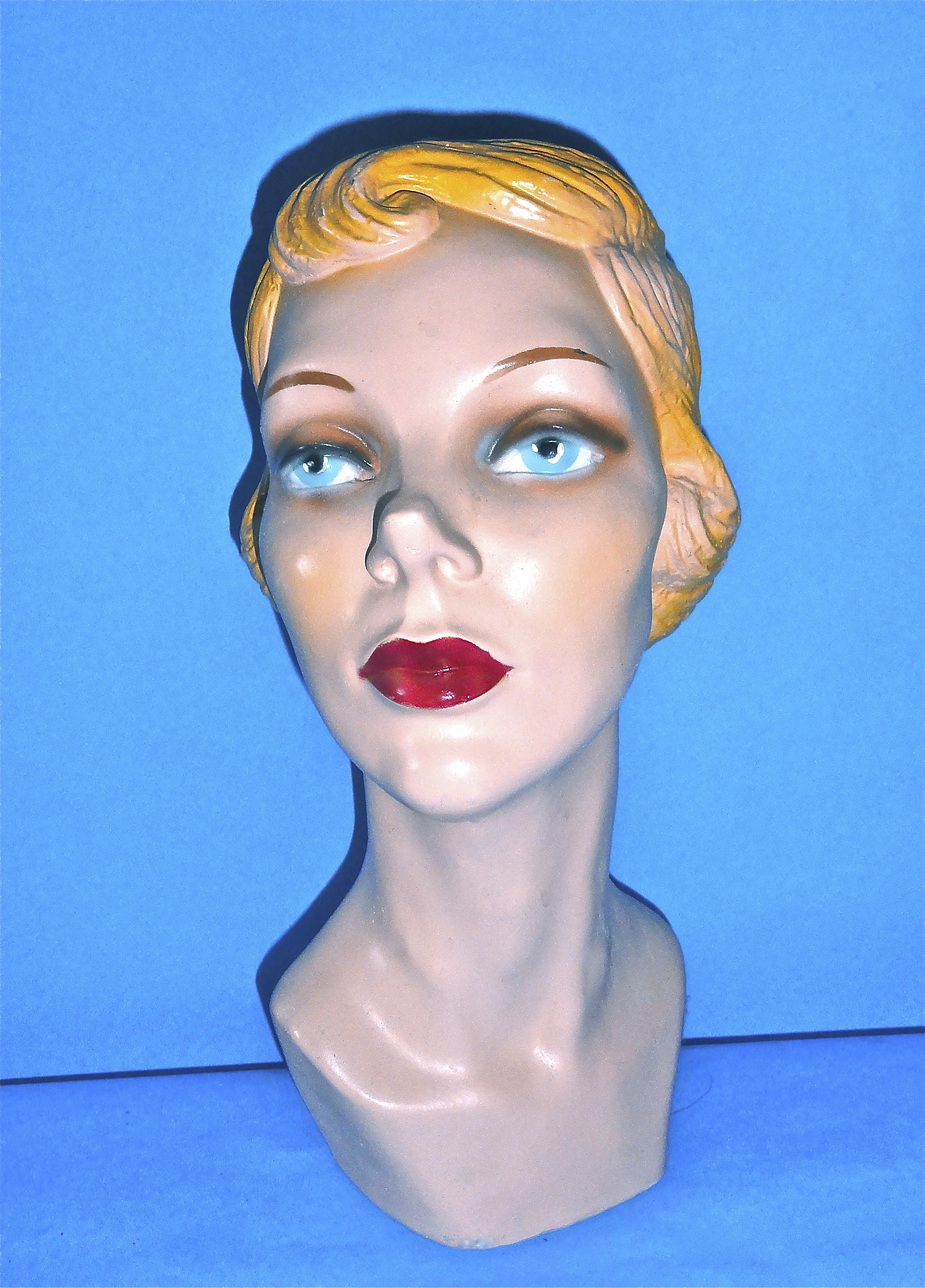 Chalk mannequin with wavy, blondish-red hair - UWDC - UW-Madison Libraries