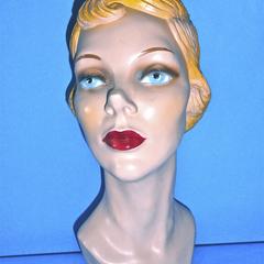 Chalk mannequin with wavy, blondish-red hair