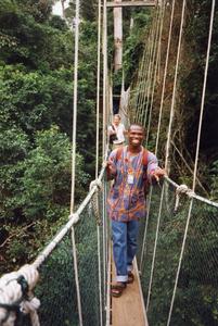 Men on rope bridge in Kakum National Park