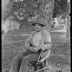 Man sitting under a tree