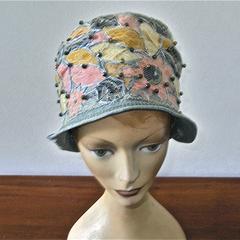 Helmet cloche made of blue shimmery fabric