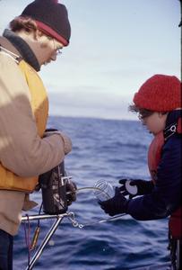 Measuring dissolved oxygen on deck of R/V Neeskay