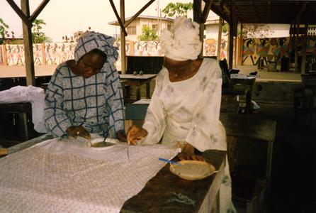 Women designing fabric