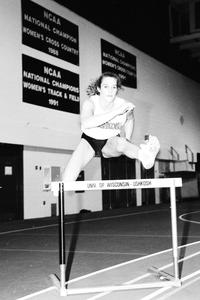 Female jumping hurdles