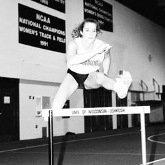 Female jumping hurdles