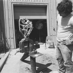 Student working on metal sculpture