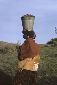 Southern Africa : Domestic Activities : Xhosa woman with pail