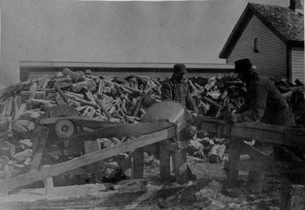 Sawing wood at Rosiere, Wisconsin