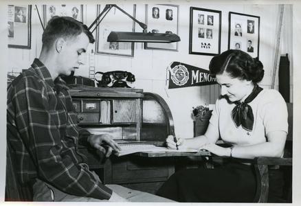 Stout Student Association, John Christianson and Rowena Christen working in S.S.A. Office