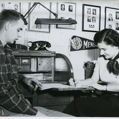 Stout Student Association, John Christianson and Rowena Christen working in S.S.A. Office