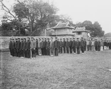Chinese-English school boys drilling in Yeungkong 陽江. Reverend (Doctor) C.C. Patton in charge.