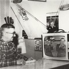 Romy Gosz watches himself on television