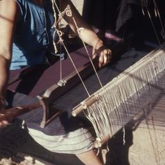 Ethnic Phuan girl weaving