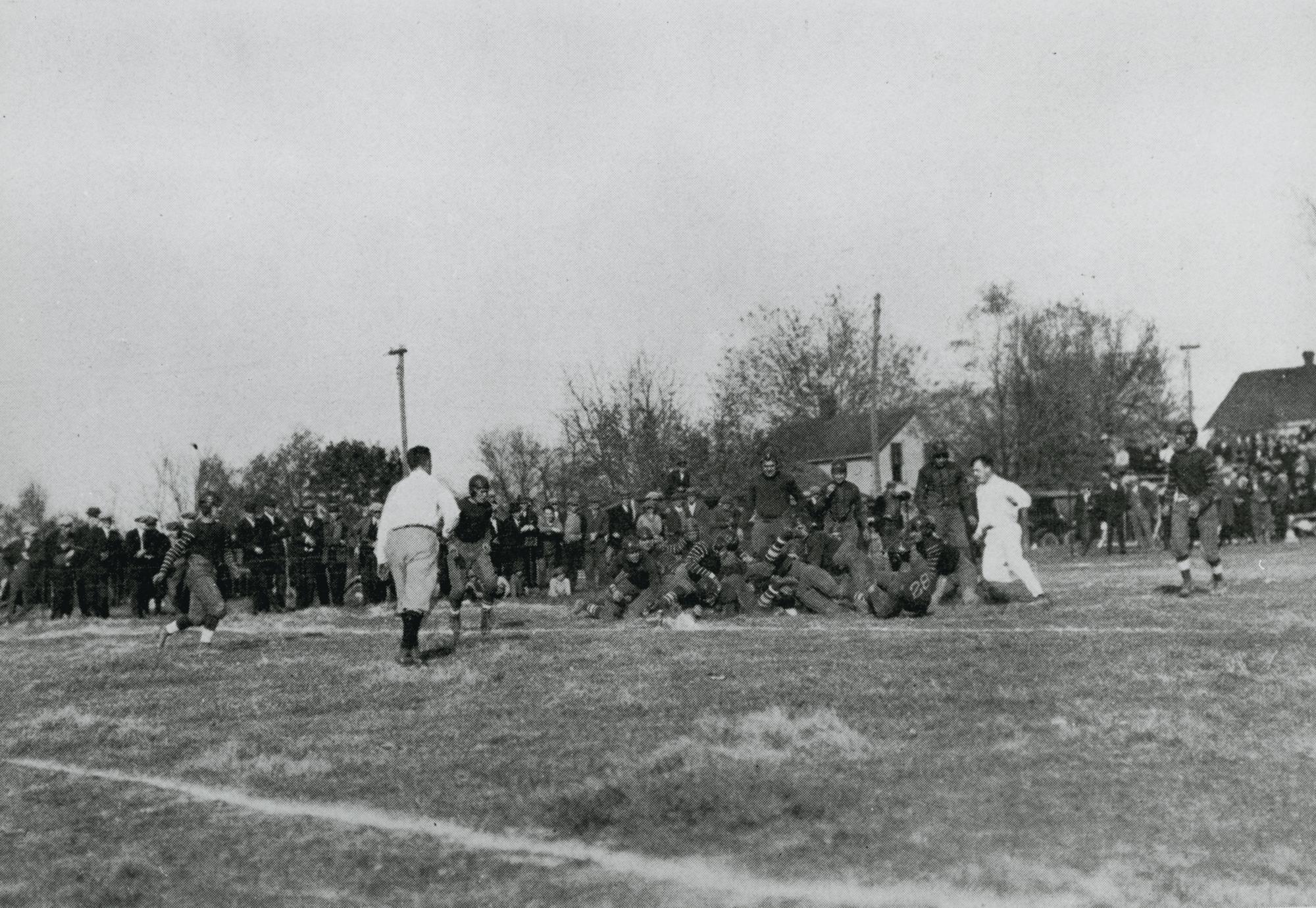 End of football play by Wisconsin Mining School