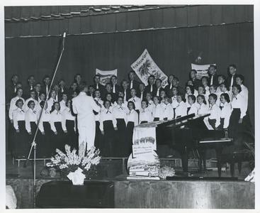 Stout Symphonic Singers performing on stage
