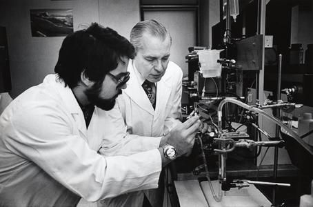 Walter Blaedel and student in the lab