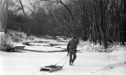Aldo Leopold pulling empty sled