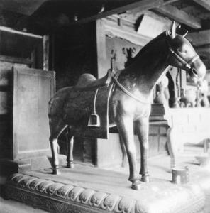 A bronze horse in a temple.